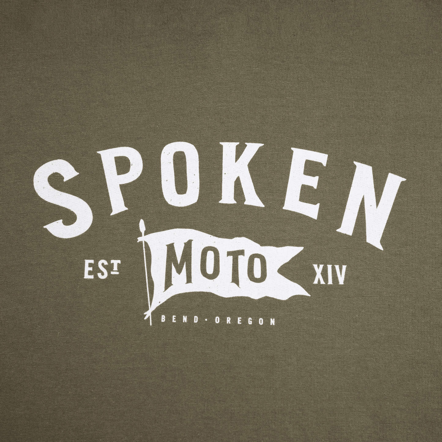 Detail shot of Spoken Moto logo.
