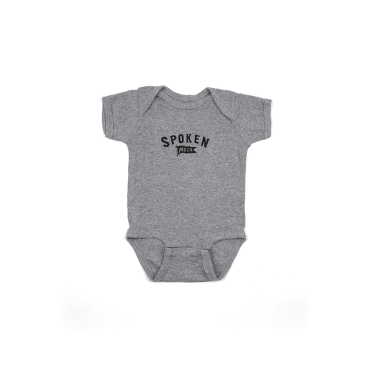Grey Spoken Baby Onesie with Spoken Moto Flag logo on the center of the chest.